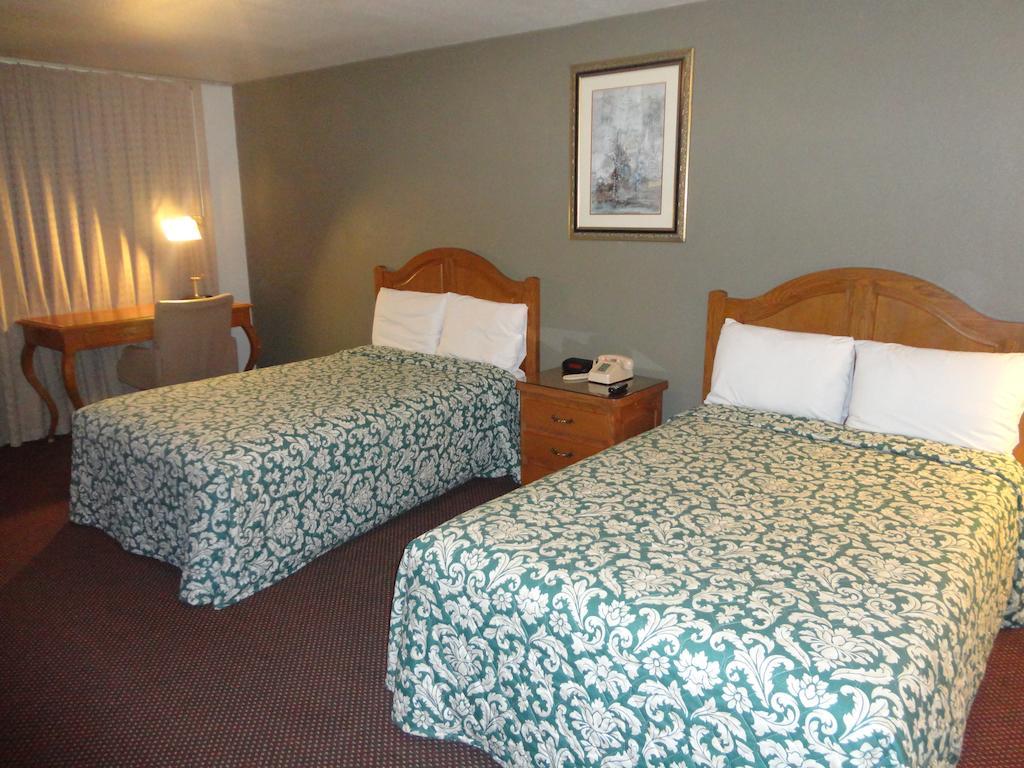 Garden Inn And Suites Silsbee Номер фото